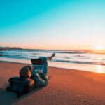 Digital nomadism provides the flexibility to live and work from different locations, often resulting in lower living costs and maximized income.