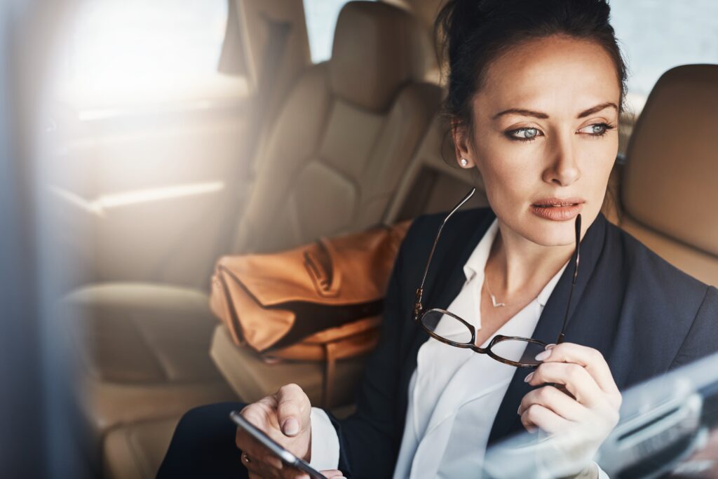 Business,Woman,,Phone,And,Travel,To,Work,While,Thinking,For