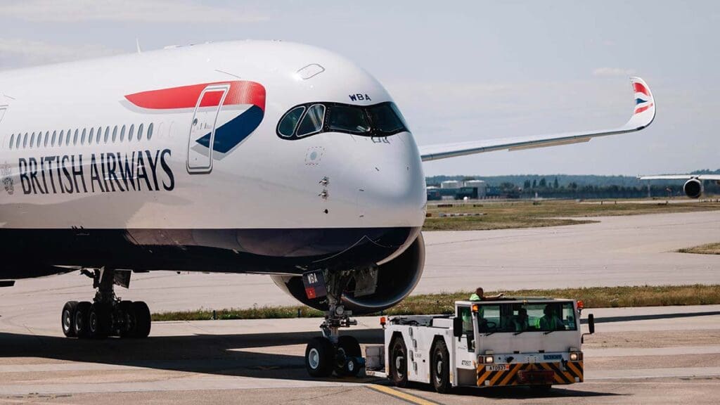 The morning light filters through the plate-glass windows of British Airways’ Waterside headquarters at Heathrow, casting long reflections across the quiet atrium. Outside, jets lift steadily into the sky, each one a reminder of the tension at the heart of modern aviation: an industry built to connect the world, yet under immense pressure to curb its carbon footprint.