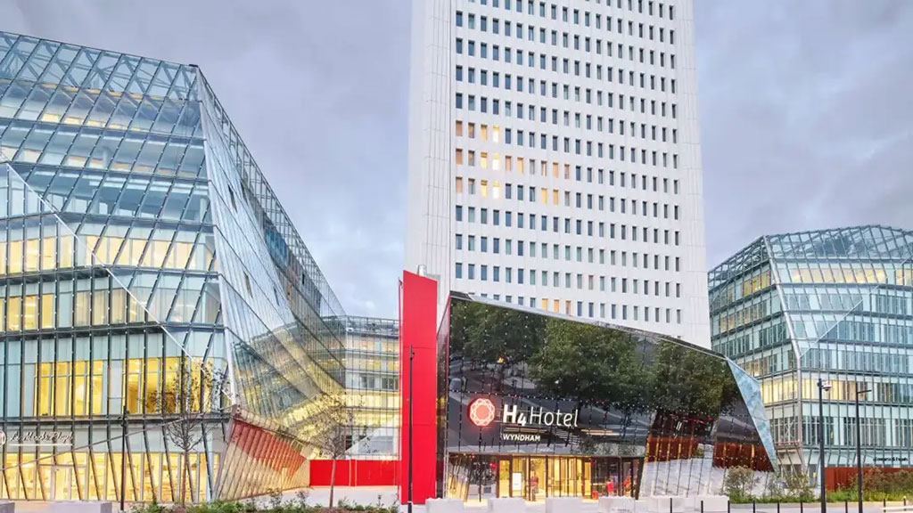 Saint-Denis, the district just north of Paris best known for the Stade de France and its industrial heritage, is mounting a serious claim on the capital's business travel market, and the H4 Hotel Wyndham Paris Pleyel Resort has become the clearest symbol of that shift.