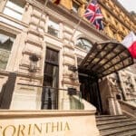 Ministers have confirmed they will press ahead with controversial plans to allow the mayors of England's largest city-regions to charge a tax on overnight stays, in a move that has reignited fury across the business travel and hospitality industries.