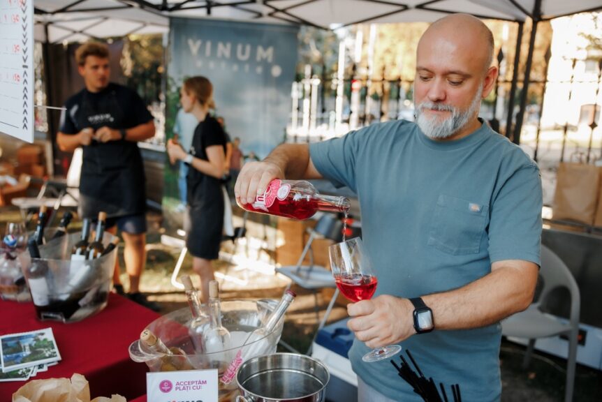 Man,Pouring,Red,Wine,At,Wine,Festival.,Chisinau,,Moldova,7