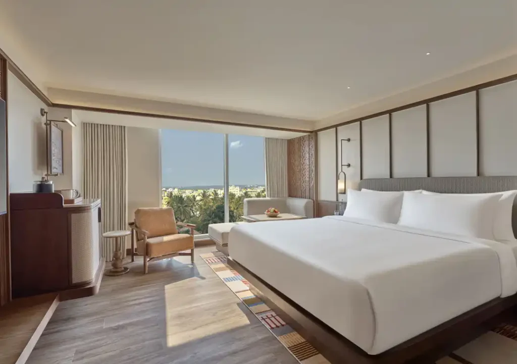 Slohh-by-Roach-Curio-Collection-by-Hilton-–-Deluxe-King-Room