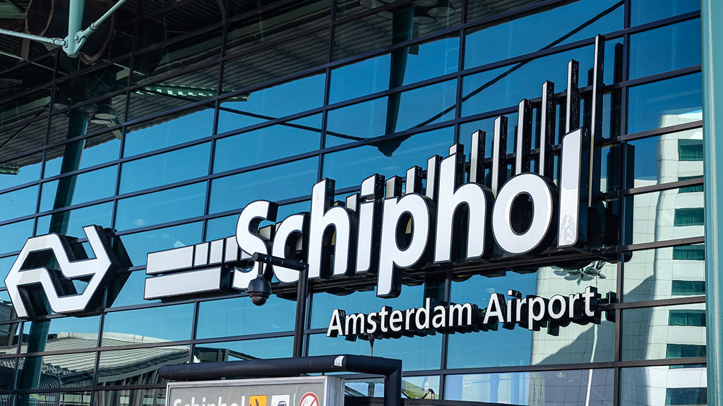 Amsterdam Schiphol handled fewer flights in the first six months of 2026, yet its owner insists appetite for travel has not weakened, a message that matters to the thousands of UK companies routing staff through the Dutch hub every week.