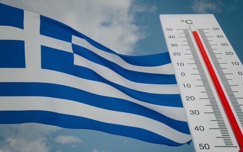 Heat,Wave,In,Greece,,Thermometer,In,Front,Of,Flag,Greece