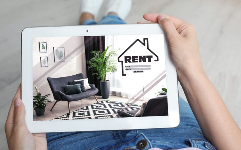 Woman,Searching,For,Apartment,On,Rental,Property,Website,Via,Tablet