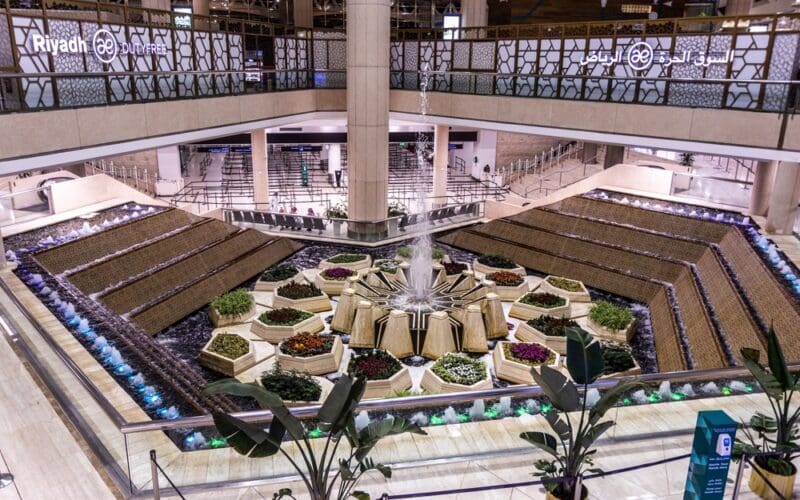 Boarding calls have gone quiet in Riyadh, and the King Khalid International Airport silent airport switch means UK business travellers must now watch screens and phones instead.