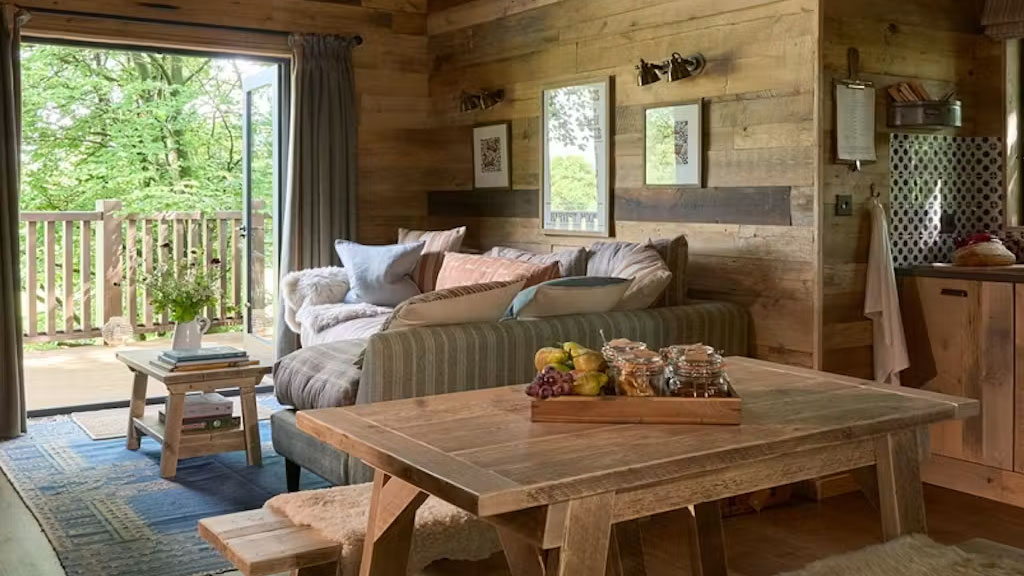 The new Calcot Manor treehouses near Tetbury pair two bedrooms, a deck sauna and all-day spa access, giving UK business travellers a strong reason to extend a Cotswolds trip.