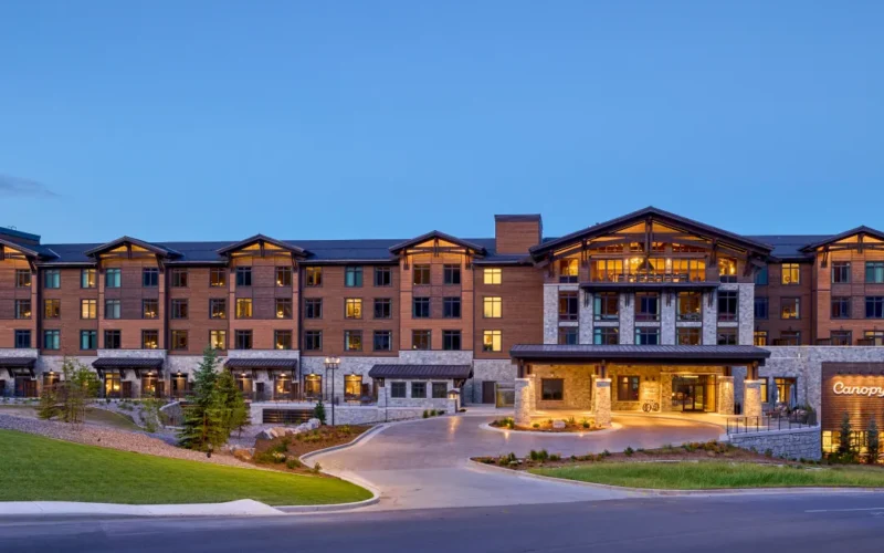 Canopy Deer Valley exterior in stone and wood at the base of Deer Valley Resort in Park City, Utah