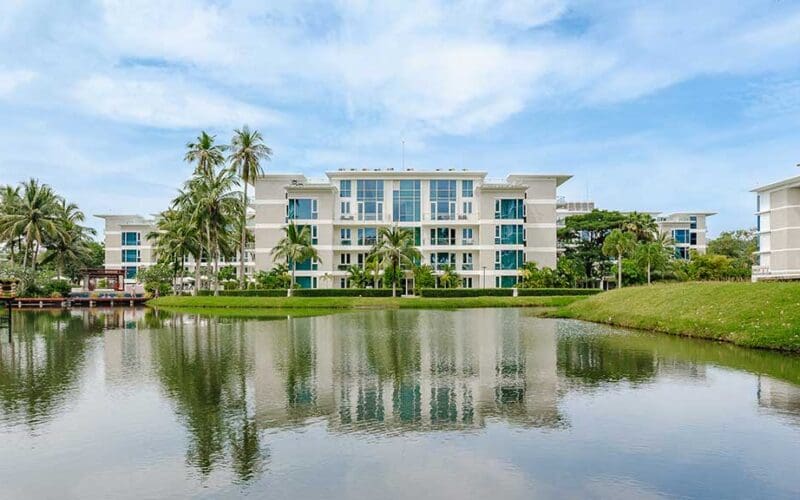 Beachfront pool and villas at Rixos Water World Phuket on Mai Khao beach, Thailand