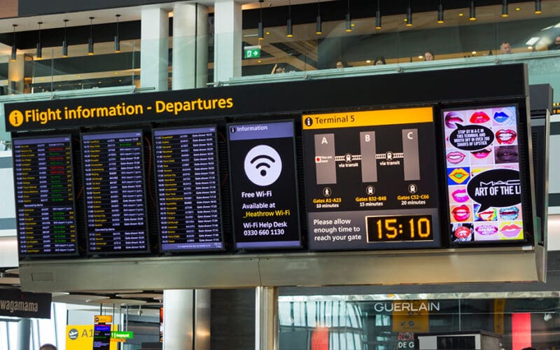 Departures board and check-in desks at Heathrow Terminal 5 as the Heathrow airport charge rises from January 2027