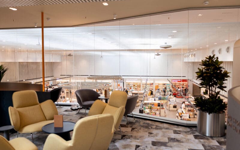 Seating and workspace inside the refurbished Vilnius Airport lounge run by Aspire Pre-Flight Hospitality