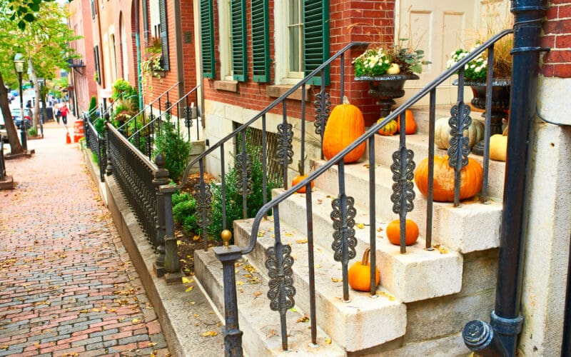 Lantern-lit historic street in the city centre at dusk during Halloween in Boston